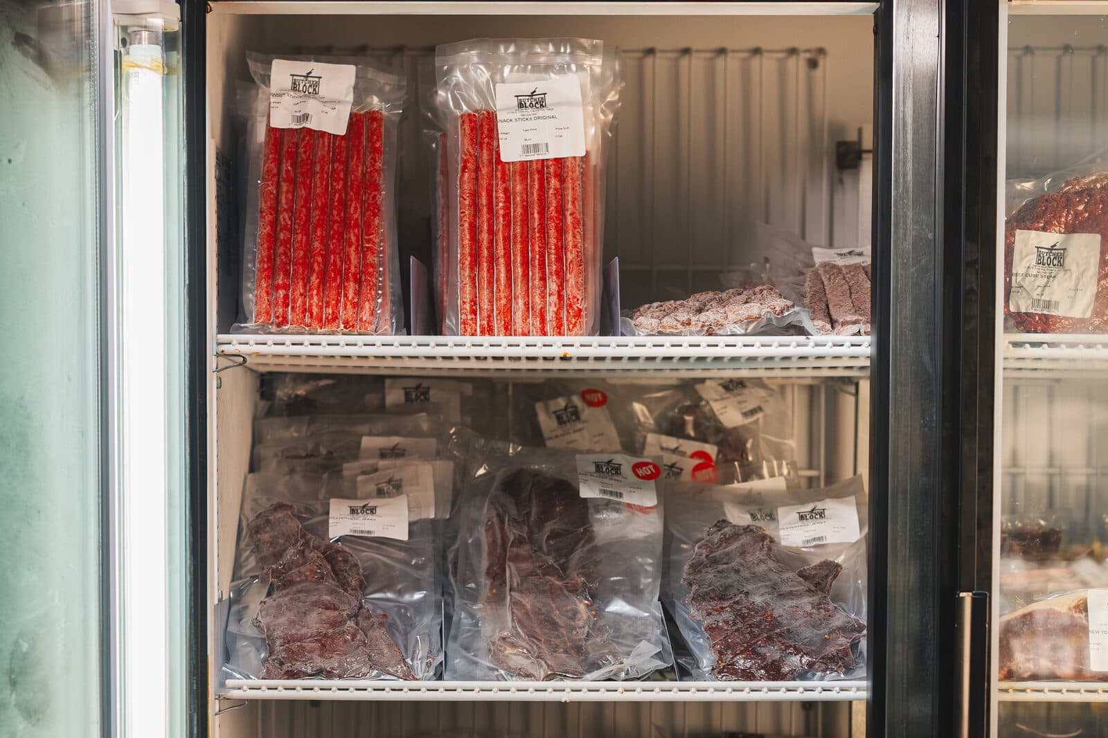 Jerky, snack sticks, and summer sausage on the shop shelf